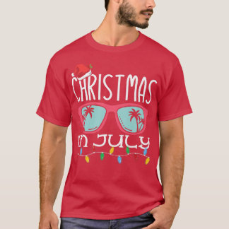 7月のクリスマスサンタハットサングラス夏のビーチ Tシャツ