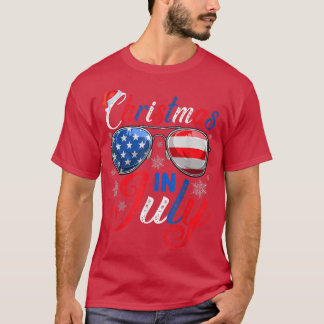 7月のクリスマスサンタハット米国国旗のサングラスサム Tシャツ