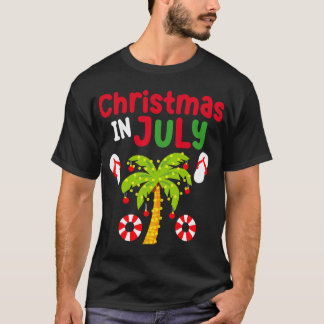 7月のクリスマスフラミンゴサーフィンココナッツツリース Tシャツ