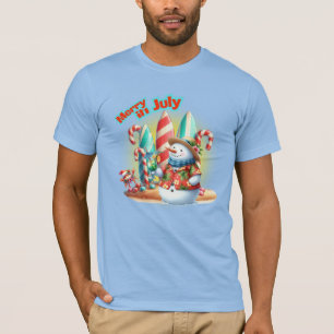 7月の陽気なクリスマス、ビーチでサーフィンを楽しむ雪だるま Tシャツ