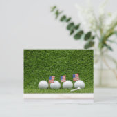 7月4日アメリカ国旗が緑に輝くゴルフボール ポストカード (スタンド正面)