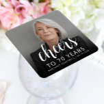 70th Birthday Party Photo Cheers White Script スクエアペーパーコースター<br><div class="desc">This custom 70th birthday paper coaster features the guest of honor's personalized photo,  name,  and birthday,  along with the word "Cheers" in elegant white calligraphy script. A dark screen helps make the text pop. A great way to celebrate someone who's turning seventy!</div>