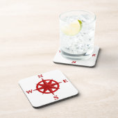 8点のコンパス面図、深紅および白い コースター (右側)