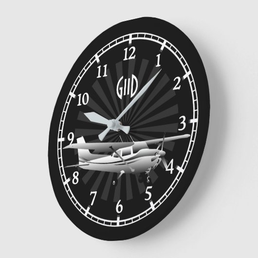 aの航空機のセスナのシルエットの日が差すことのモノグラム ラージ壁時計 (傾斜)