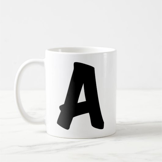 "A"のマグカップ コーヒーマグカップ (左)