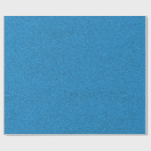 A blue sheet of textured material rolled up at one ラッピングペーパー (フラット)