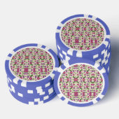 A casino chip features intricate floral patterns ポーカーチップ (積み重ね)