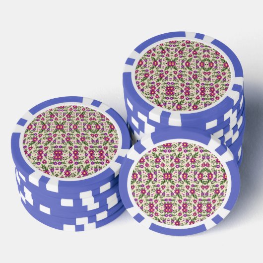 A casino chip features intricate floral patterns ポーカーチップ (積み重ね)