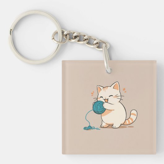 A cat spinning yarn is so cute キーホルダー (正面)