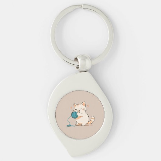 A cat spinning yarn is so cute キーホルダー (正面)