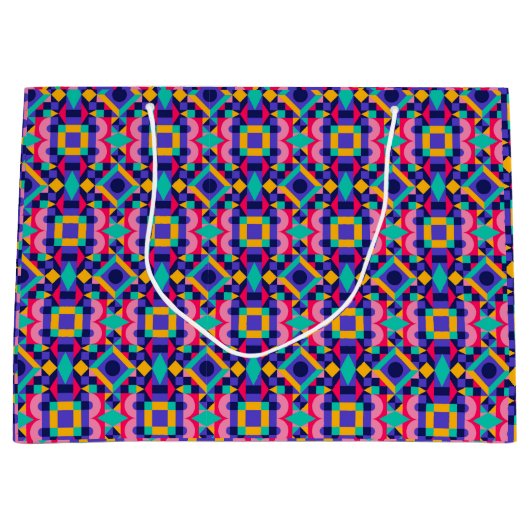 A colorful gift bag with a vibrant geometric ラージペーパーバッグ (正面)