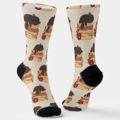 A cute kitten sleeping curled up on a pile of book ソックス (傾斜あり)