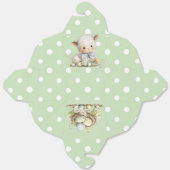 A cute sheep lies in a clearing with Easter eggs フェイバーボックス (見開き)