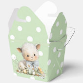 A cute sheep lies in a clearing with Easter eggs フェイバーボックス (見開き)