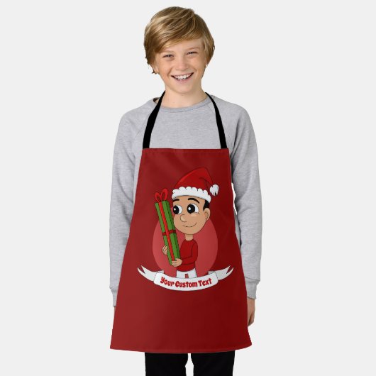 A cute toddler holding a Christmas present エプロン (着用した状態)