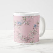 a delicate bouquet of wildflowers on a pink backgr ジャンボコーヒーマグカップ (正面右)