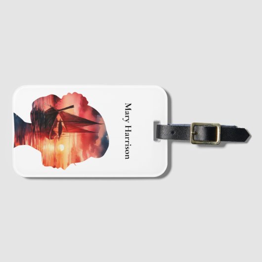 A fantasy journey on a sailboat at sunset ラゲッジタグ (正面横)