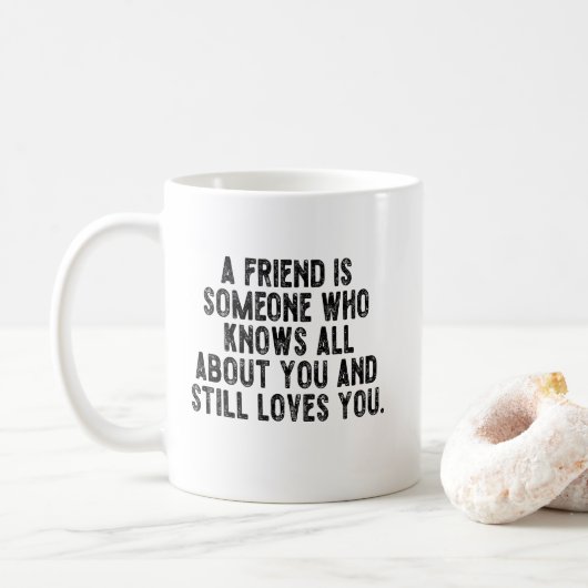 A friend is someone who knows all about you and st コーヒーマグカップ (ドーナツ)