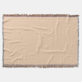 A gingham checkered blanket in shades of beige  スローブランケット