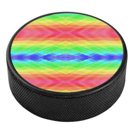 A hockey puck with a vibrant, symmetrical rainbow  アイスホッケーパック