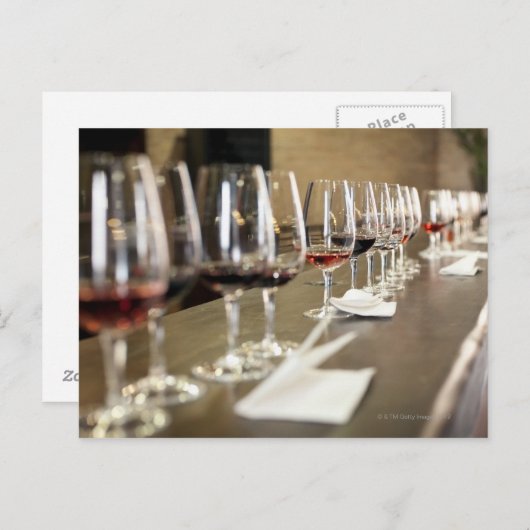 A long row of wine glasses set up so a large ポストカード (正面/裏面)