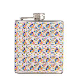 A metal flask is shown with a vibrant geometric  フラスク