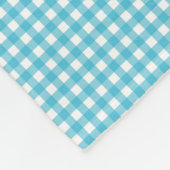 A patterned fabric with a blue and white gingham  フリースブランケット (角)