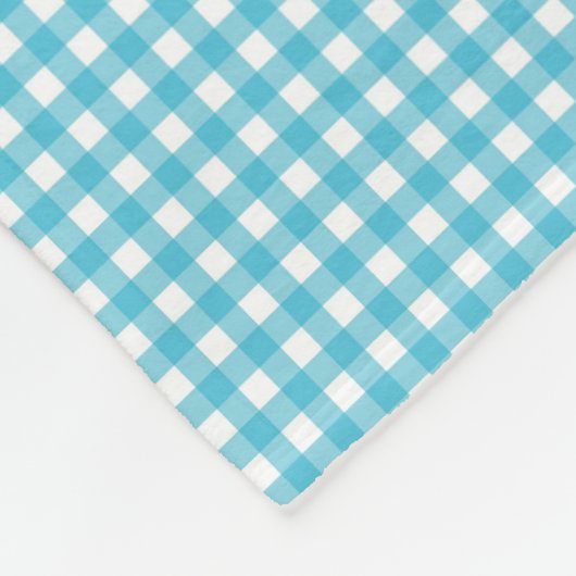 A patterned fabric with a blue and white gingham  フリースブランケット (角)