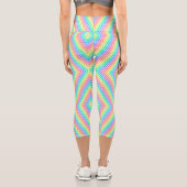 A person is wearing vibrant, colorful leggings  カプリレギンス (裏面)