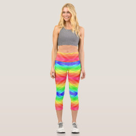 A person wearing vibrant, rainbow-colored leggings カプリレギンス