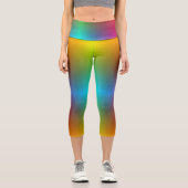 A person wearing vibrant, rainbow-gradient legging カプリレギンス (正面)