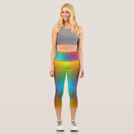 A person wearing vibrant, rainbow-gradient legging カプリレギンス