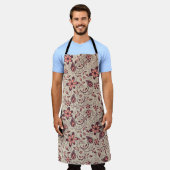 A person wears a floral-patterned apron  エプロン (着用した状態)
