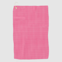 A pink towel with a subtle grid pattern