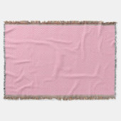 A pink woven blanket with a subtle pattern  スローブランケット (正面)