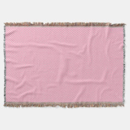 A pink woven blanket with a subtle pattern  スローブランケット