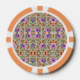 A poker chip with an intricate floral pattern  ポーカーチップ