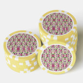 A round decorative plate with a detailed floral  ポーカーチップ (積み重ね)