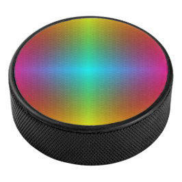 A round, multicolored object with a glossy アイスホッケーパック
