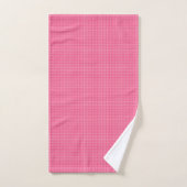 A set of pink gingham-patterned bath linens hangs  バスタオルセット (ハンドタオル)
