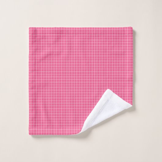 A set of pink gingham-patterned bath linens hangs  バスタオルセット (ウォッシュタオル)