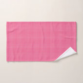 A set of pink gingham-patterned bath linens hangs  バスタオルセット (ハンドタオル)