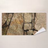 A stone wall made of cobblestones background textu バスタオル (バスタオル)