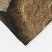 A stone wall made of cobblestones background textu フリースブランケット (角)