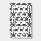 A symmetrical monochrome design featuring intricat バッジ (裏面)