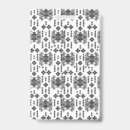 A symmetrical monochrome design featuring intricat バッジ