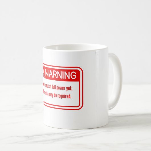 A tea cup with a funny and distinctive warning des コーヒーマグカップ (正面右)