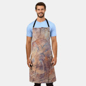 A tree in a cut. Logs lumber in the woods. Texture エプロン (着用した状態)