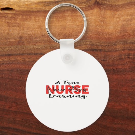 A True Nurse Never Stops Learning Quote Nursing Mo キーホルダー (正面)
