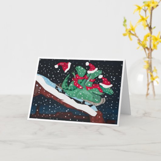 A whimsical holiday card with sledding dinosaurs カード (黄色い花)